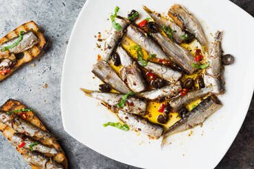 close up of spanish sardines in olive oil