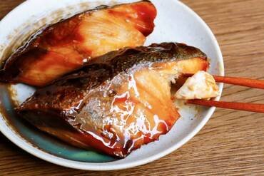 A traditional Japanese dish made by baking yellowtail and seasoning.